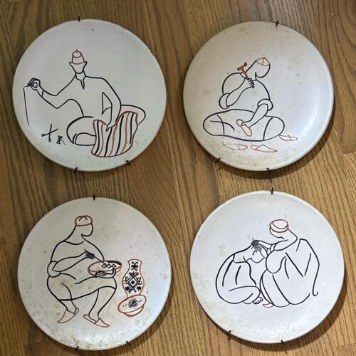 Set of Four Ceramic Wall Plates with Artisan Scenes