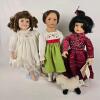 Trio of Porcelain Dolls With Stands