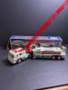 2000 Hess Fire Truck Toy with Detachable Ladders in original box.
