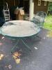 Oval Glass Top Wrought Iron Patio Table with 3 Mesh Chairs