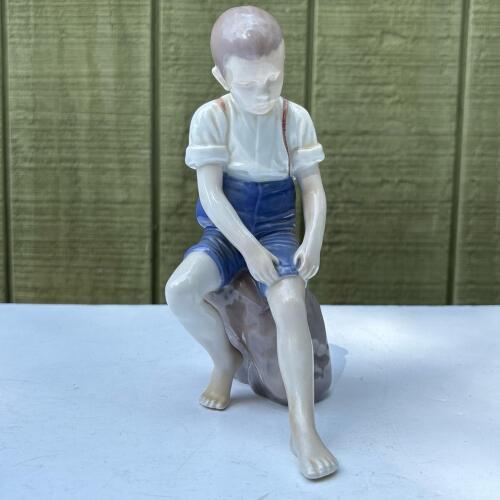 Bing & Gr&oslash;ndahl "Boy Sitting on a Rock" Porcelain Figurine