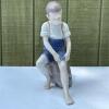 Bing & Gr&oslash;ndahl "Boy Sitting on a Rock" Porcelain Figurine