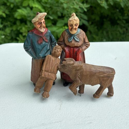 Four Carved Wooden Folk Figurines