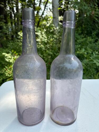 Pair of Amethyst Glass Bottles
