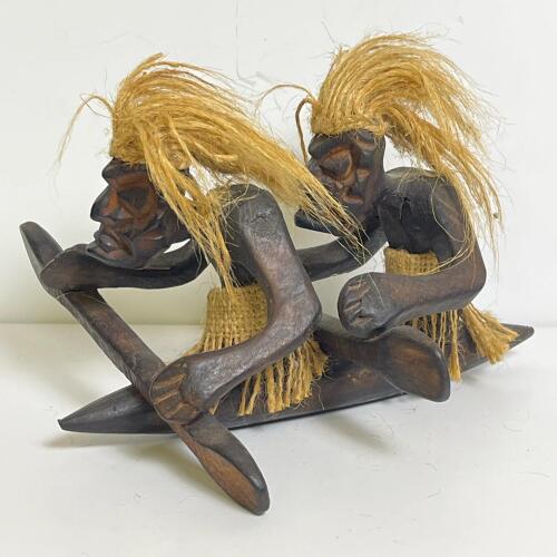 Hand-Carved Wooden Outrigger Canoe Sculpture