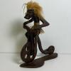 Hand-Carved Wooden Tribal Figurine Riding Bicycle