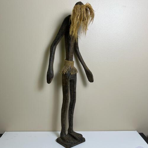 Hand-Carved Tribal Wooden Figurine with Fiber Hair and Skirt