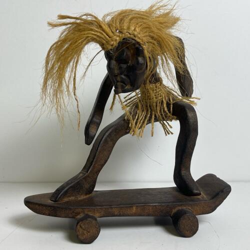 Hand-Carved Wooden Skateboarder Figurine