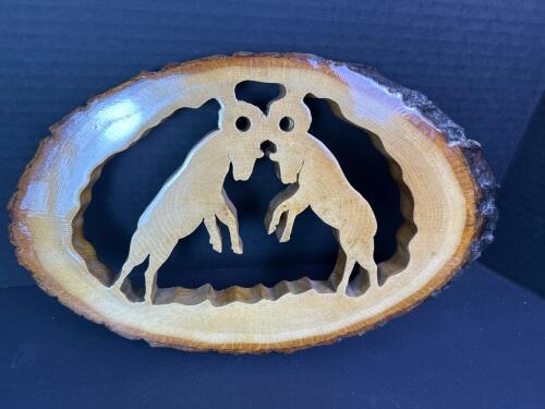 Rustic Wood Slab Wall Art Of Rams Butting Heads With A Hand-Cut Silhouette