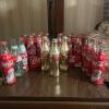 Coca-Cola Holiday Santa Bottles Lot with Trio of Gold Bottles