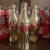 Coca-Cola Holiday Santa Bottles Lot with Trio of Gold Bottles - 2