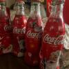 Coca-Cola Holiday Santa Bottles Lot with Trio of Gold Bottles - 5