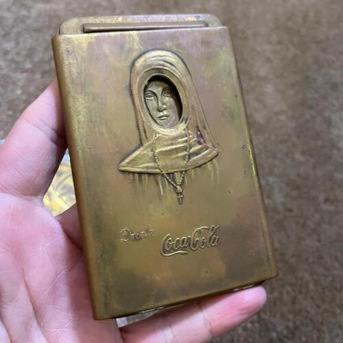 Coca-Cola "Nude Nun" Belt Buckle Cigar Cutter