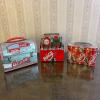 Trio of Coca-Cola Collectible Lunch Boxes - Retro Tin, Bottle, and Six-Pack Designs