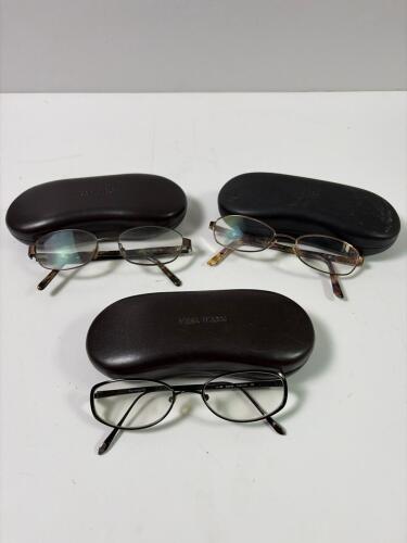 Eyeglass Trio Two Vera Wang "Glacier" Titanium, One Dana Buchman in Cases
