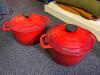 Set of 2 Red Enameled Cast Iron Dutch Ovens