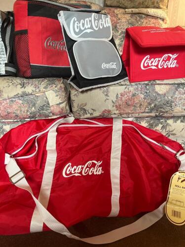 Coca-Cola Duffle Bag and Trio of Small Coolers