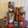 Twelve Coca-Cola Collectible Tins