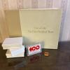 Coca-Cola 100th Anniversary Collectibles Lot &ndash; Book, Four Paperweights and Pin