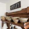 Set of Yellow Ware Bowls with Blue Bands and "Simplify" Wooden Sign