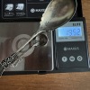Sterling Silver Spoons and Weighted Sterling Candlestick Holder - 10