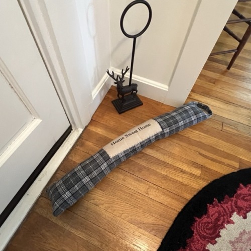 Plaid Draft Stopper and Stag Towel Holder