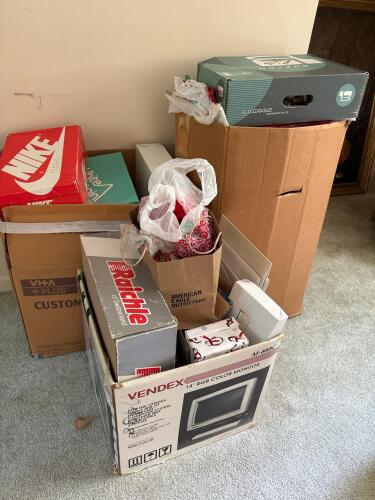 Assorted Boxes of Holiday Gift Wrap and Supplies