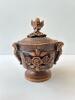 Carved Wooden Lidded Vessel with Cherub Motifs