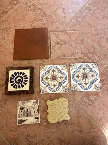 Lot of Seven Decorative Tiles and Trivets