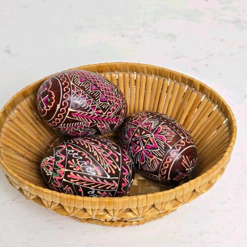 Three Decorated Eggs in Woven Basket