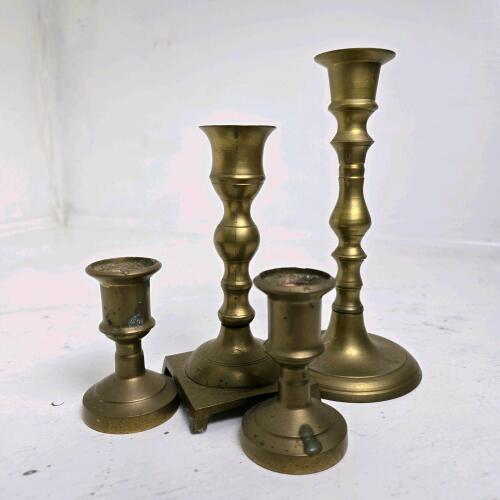 Four Brass-Toned Metal Candlesticks