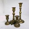Four Brass-Toned Metal Candlesticks