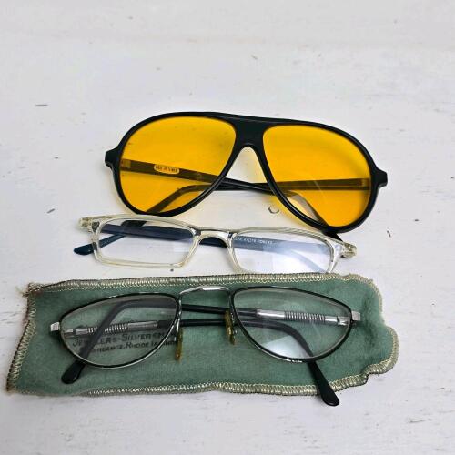 Three Pairs of Eyeglasses and Sunglasses