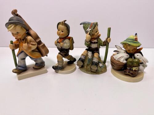 Four Goebel W. Germany Boy Figurines