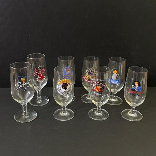 Eight Assorted German Brewery Pilsner Glasses