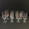 Eight Assorted German Brewery Pilsner Glasses