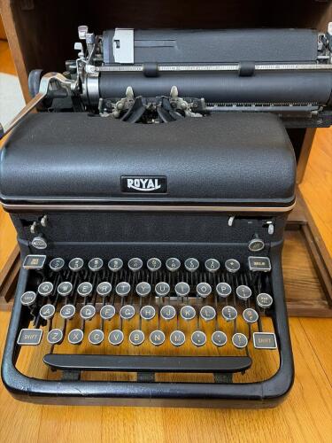 Royal typewriter with wooden typewriter stand