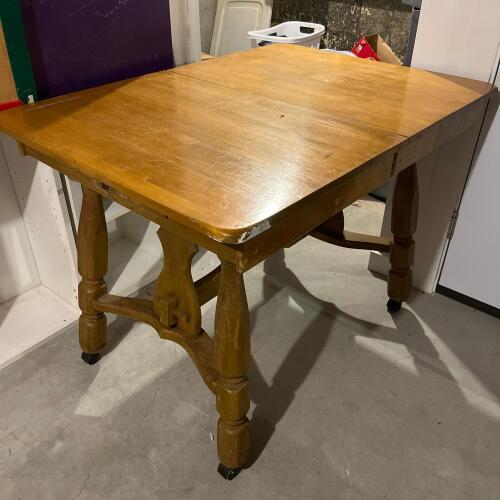 Wooden Table with Turned Legs and Casters