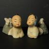 Pair Of Reclining Asian Ceramic Children Figurines