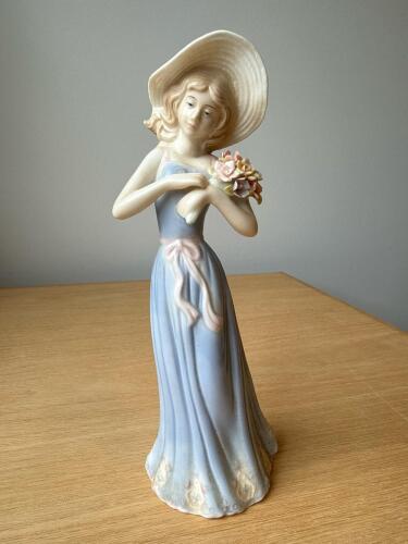 House of Lloyd Gathering Flowers Figurine
