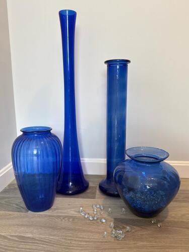 Four Blue Glass Vases with Glass Pebbles
