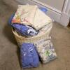 Basket of Tablecloths, Assorted Shapes and Designs