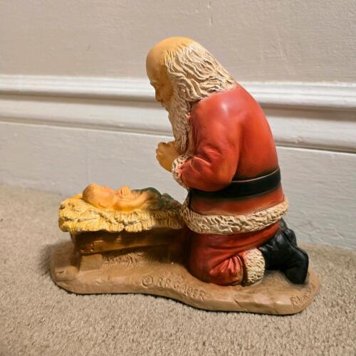 Praying Santa and Baby Jesus Figurine