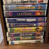 Large Assorted Family VHS and DVD Movies Lot with Stands - 5