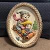 9.5" x 12" Oval Plaster Plaque Sledding Scene by B. Lewis