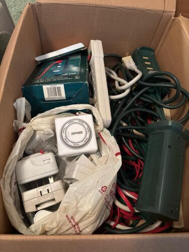 Box of Power Strips, Timers, and Extension Cords