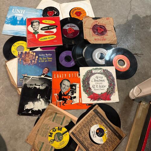 Assorted Vintage 45 RPM Records and Sleeves