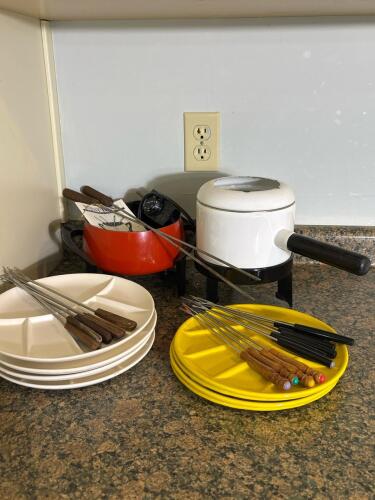 Two Vintage Fondue Sets with Forks and Plates