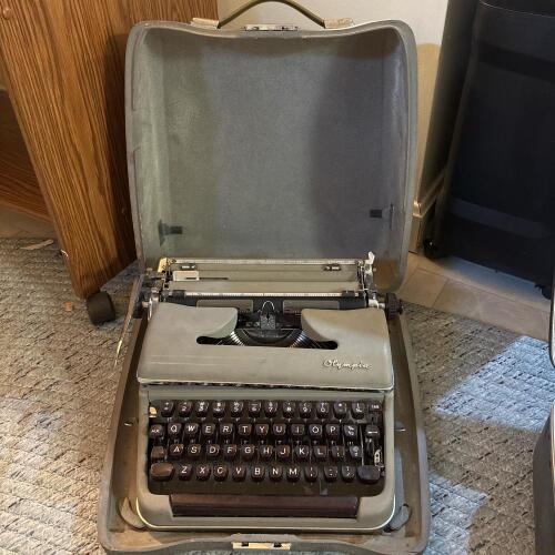 Vintage Olympia De Luxe Typewriter with Case