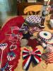 Patriotic Decor Lot: Plates, Table Runner, Uncle Sam Nutcracker, Flags & More